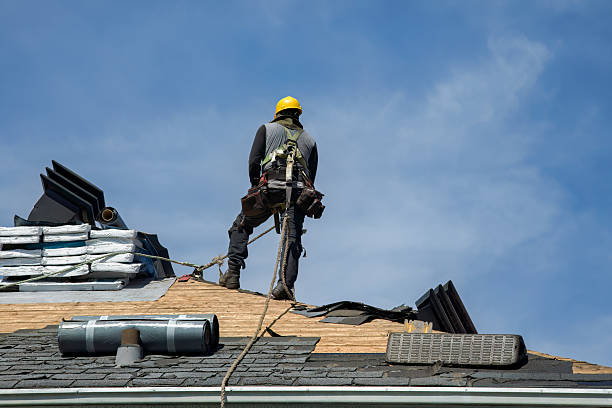Professional Roofing technician working in Henryville, IN
